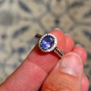 Tanzanite and white diamond/champagne diamond accents. Worn twice